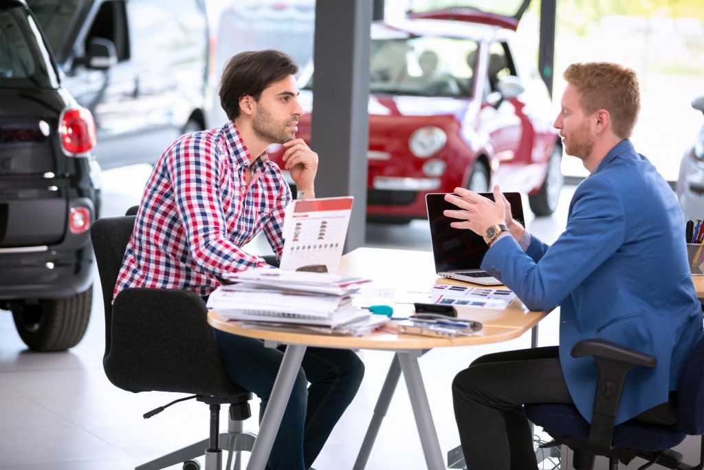 Salesman discussing product to the customer